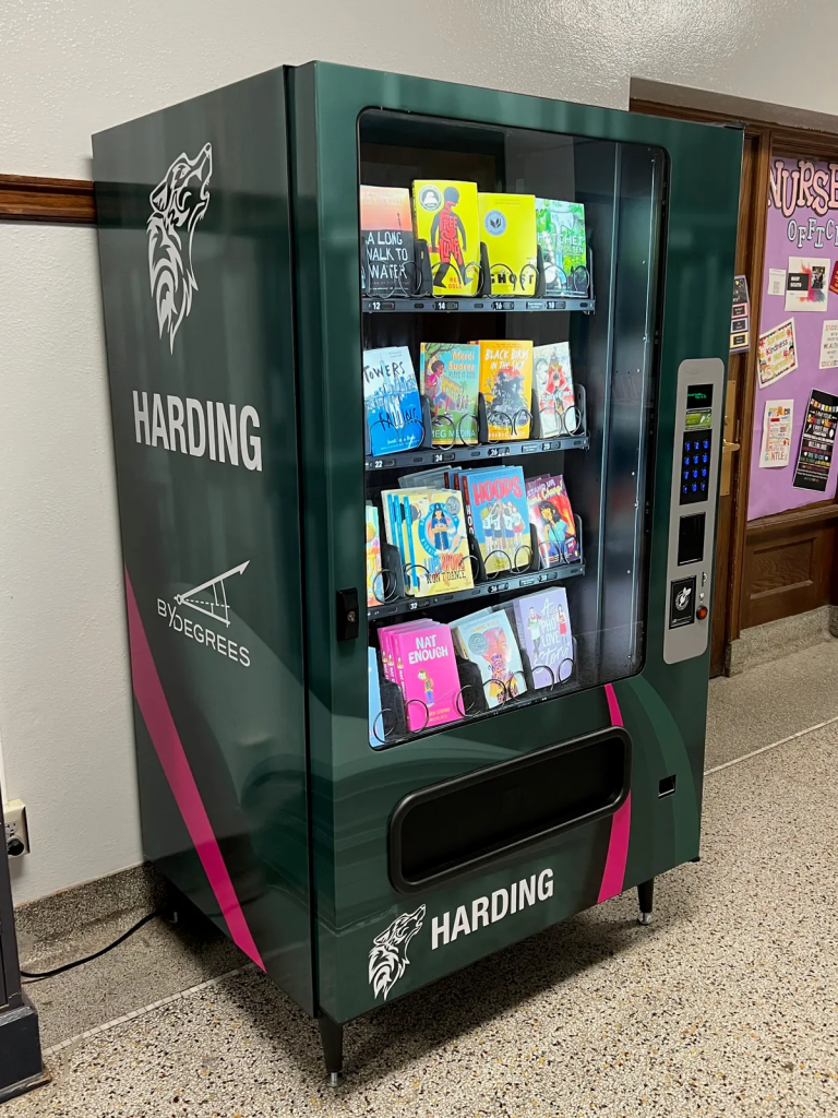 A book vending machine gives students at a Des Moines middle school incentive to read