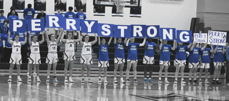 Woodward basketball battles Madrid, raises funds for Perry