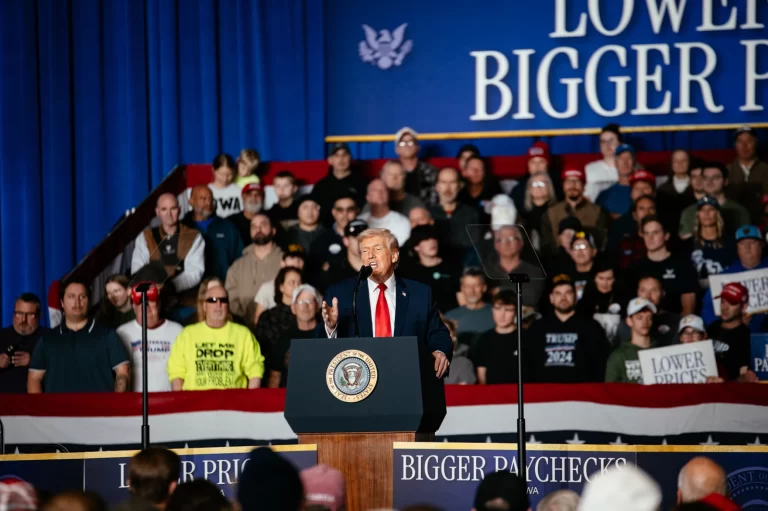 In Iowa, Trump urges GOP turnout for midterms while protesters rally over immigration enforcement deaths