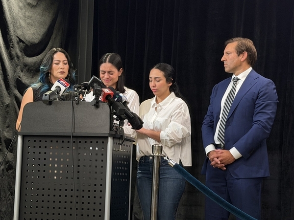 Karolina Rojas Alvarez speaks at a press conference after federal immigration agents killed her husband, Johan Sebastián Durán Guerrero, in Maine